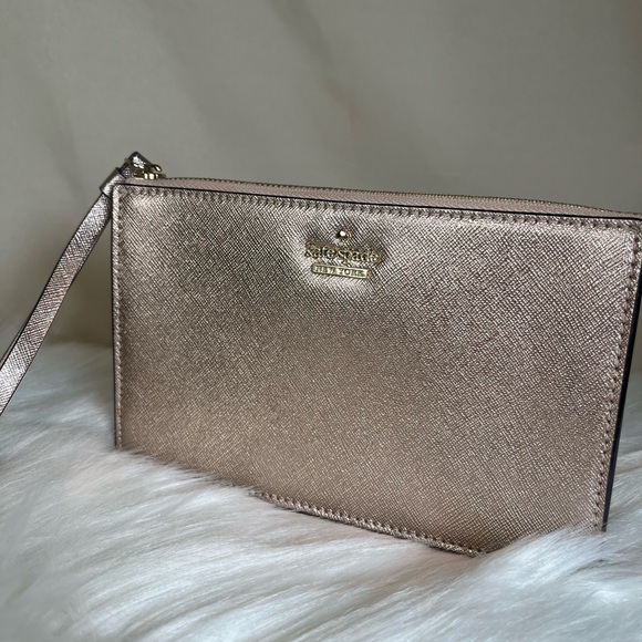 kate spade Handbags - Kate Spade Rose Gold Wristlet